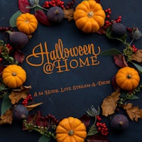 a wreath of pumpkins and leaves with the words halloween at home